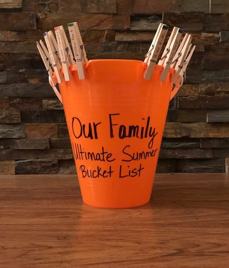 Summer bucket with clothespins